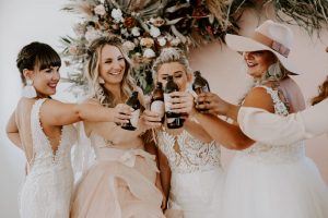 Girls Cheers in Wedding Dresses